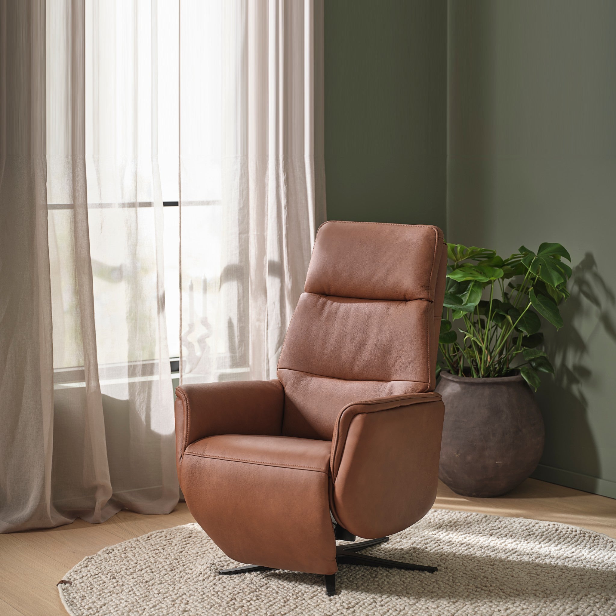 Marvin lænestol med recliner i cognac læder i stue