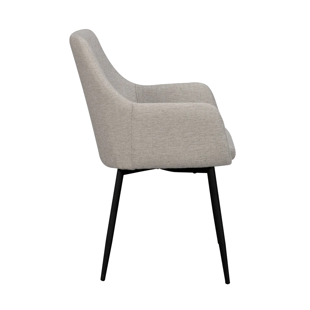 Rowico Reily spisebordsstol i beige stof med sorte metalben, set fra siden